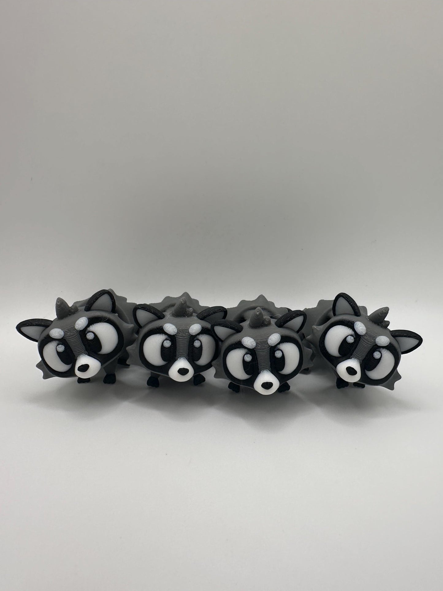 3D Printed Articulated Raccoon Figurine: Movable PLA Collectible