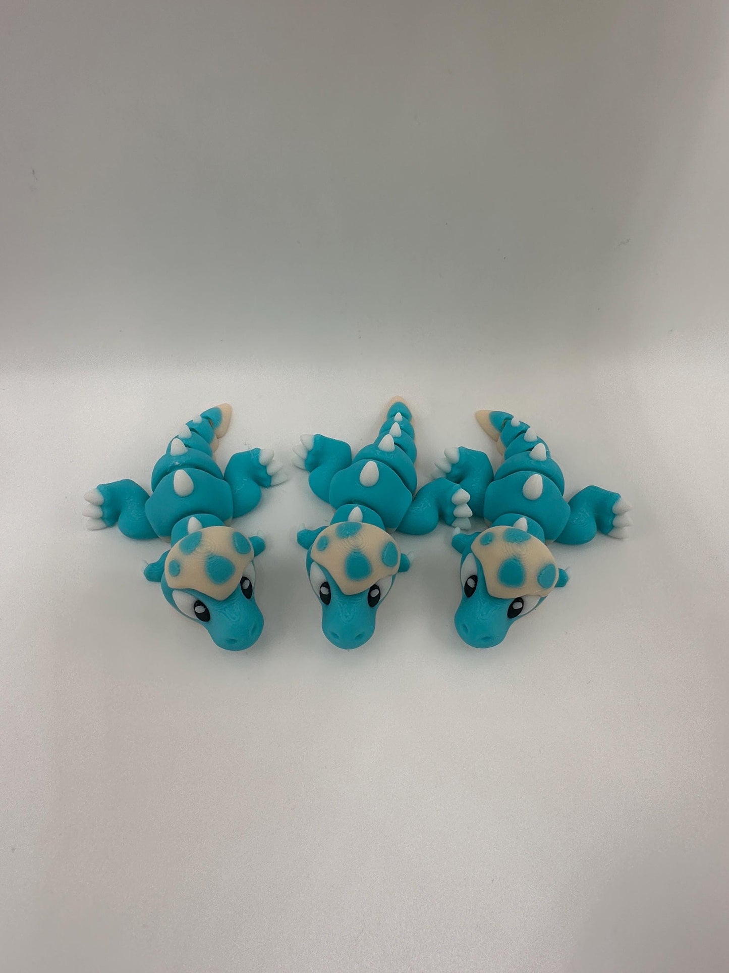 3D Printed Articulated Dinosaur Figurine: Movable Dino Toy