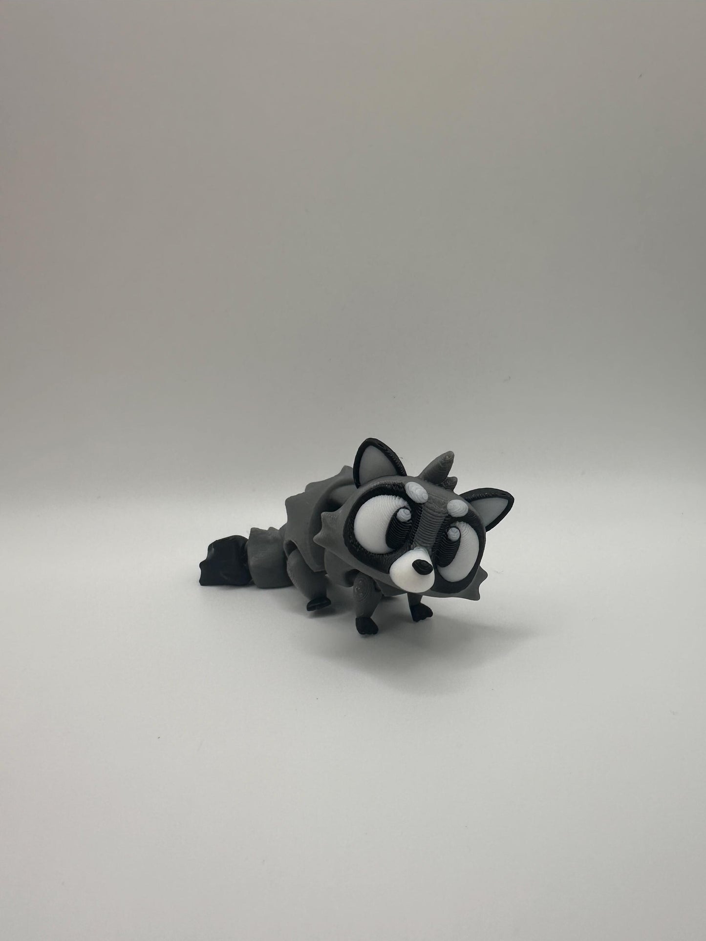 3D Printed Articulated Raccoon Figurine: Movable PLA Collectible