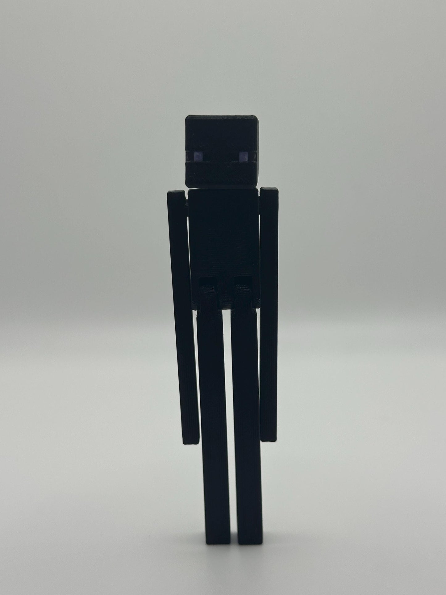 Articulated VoidMan Figure – 3D Printed Toy | Poseable pixel-Inspired Keychain Option