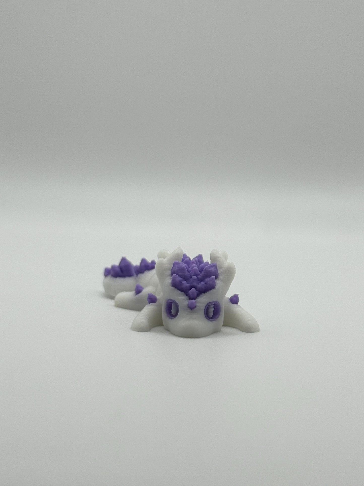 3D Printed Mini Articulated Animal Fidget Toy: Saber3D Design