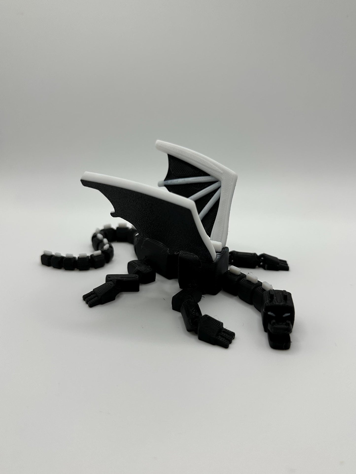Articulated Dragon Figurine: Black & White 3D Printed Model