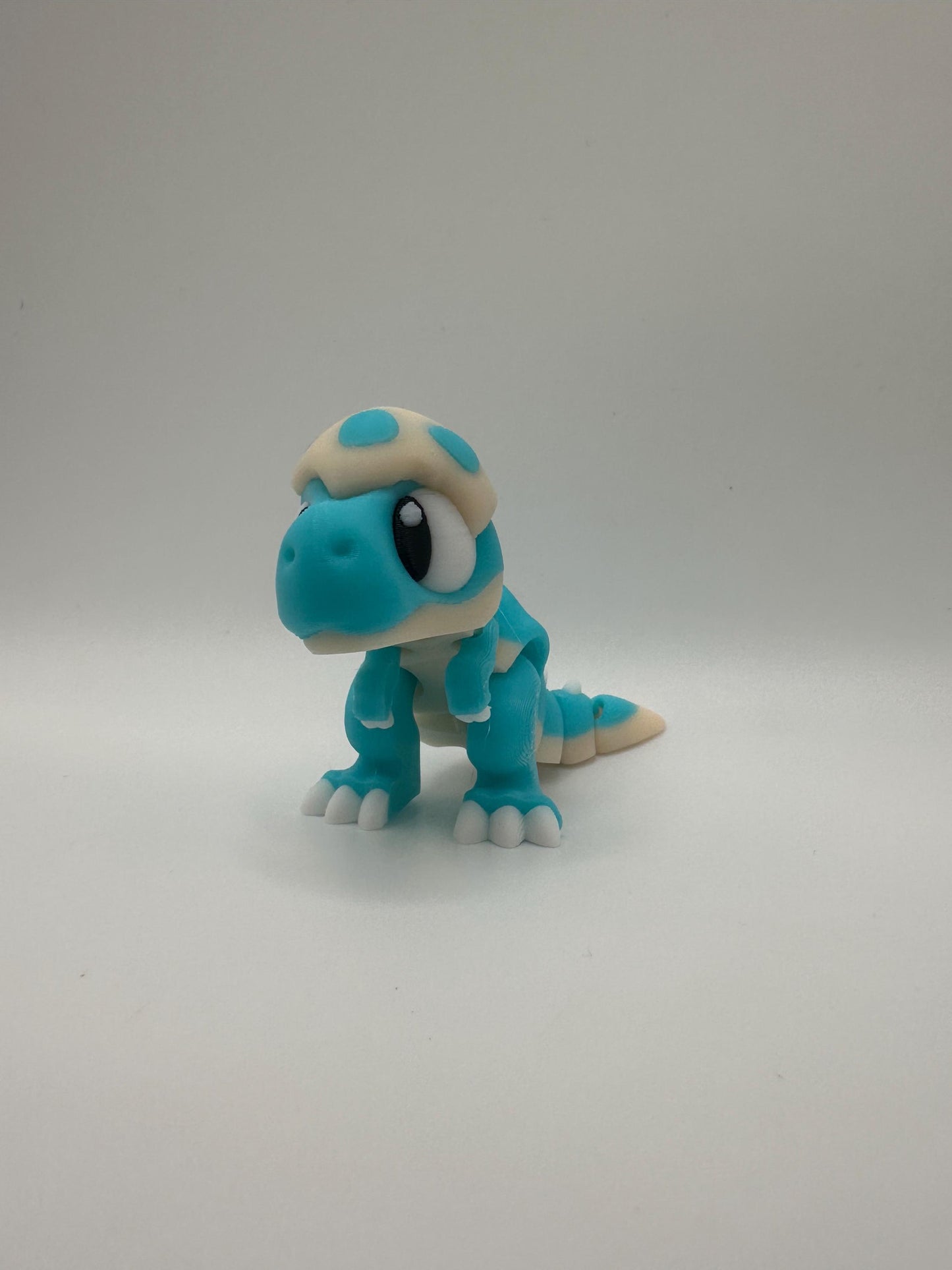 3D Printed Articulated Dinosaur Figurine: Movable Dino Toy