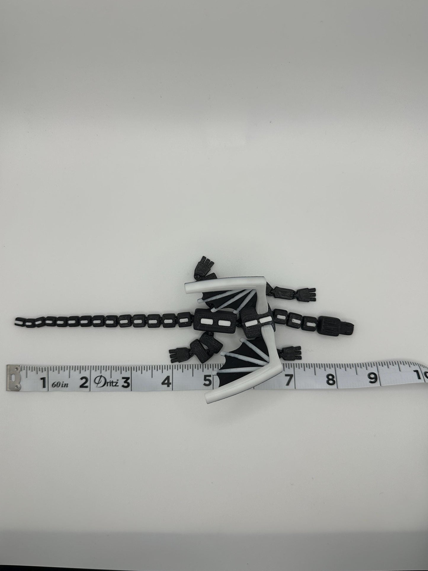 Articulated Dragon Figurine: Black & White 3D Printed Model