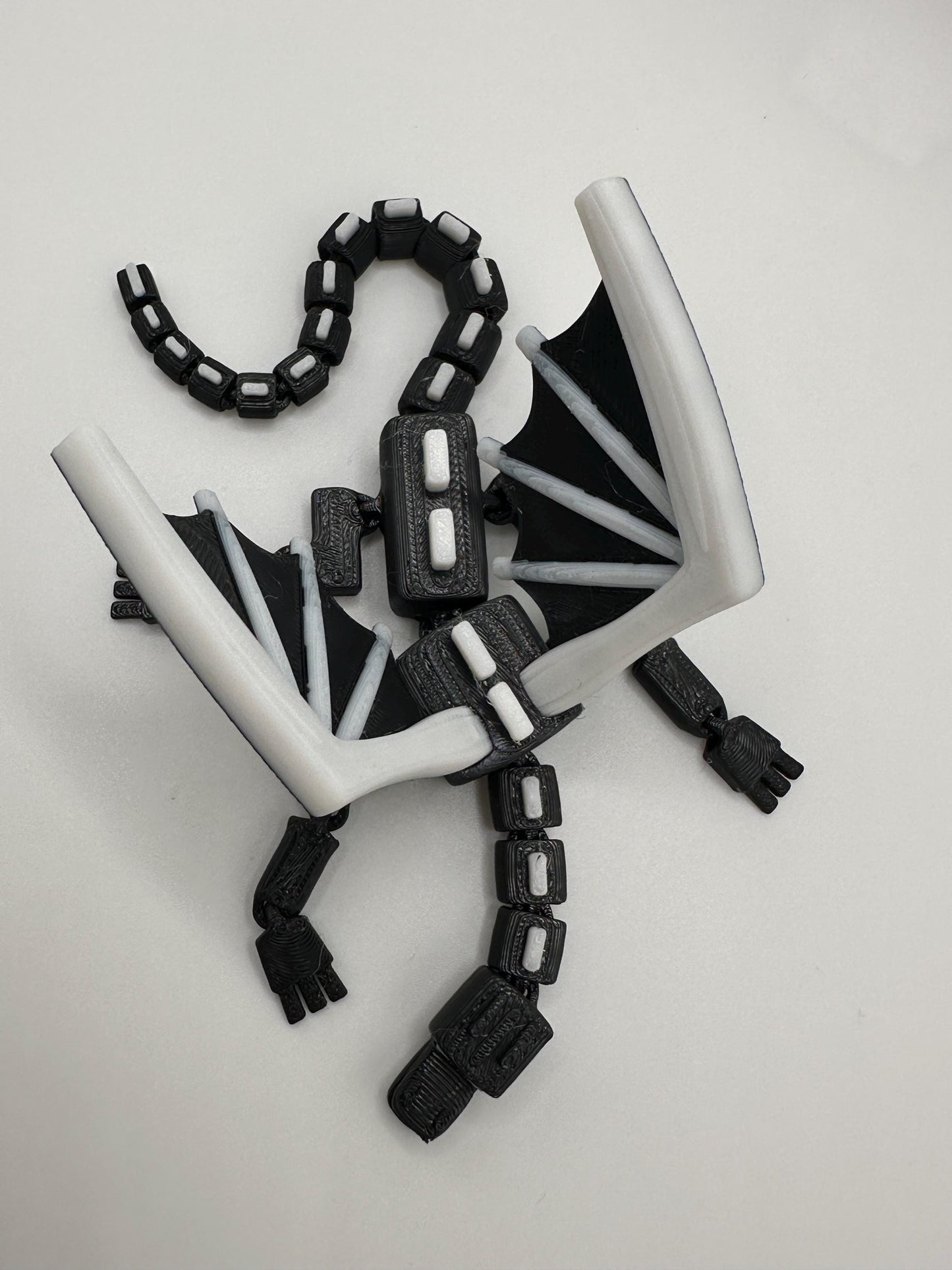 Articulated Dragon Figurine: Black & White 3D Printed Model