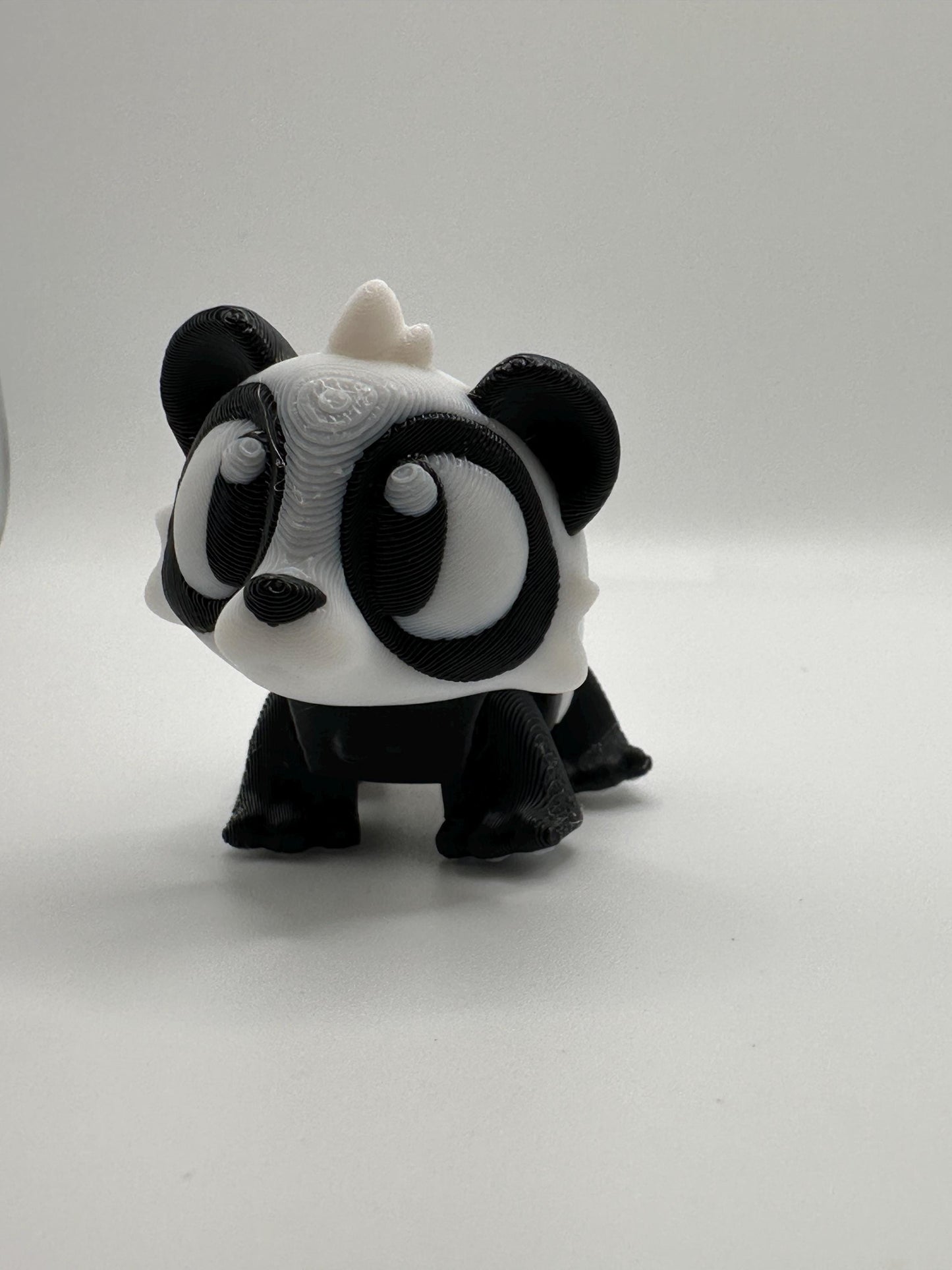 3D Printed Articulated Panda Figurine: Movable Desk Decor