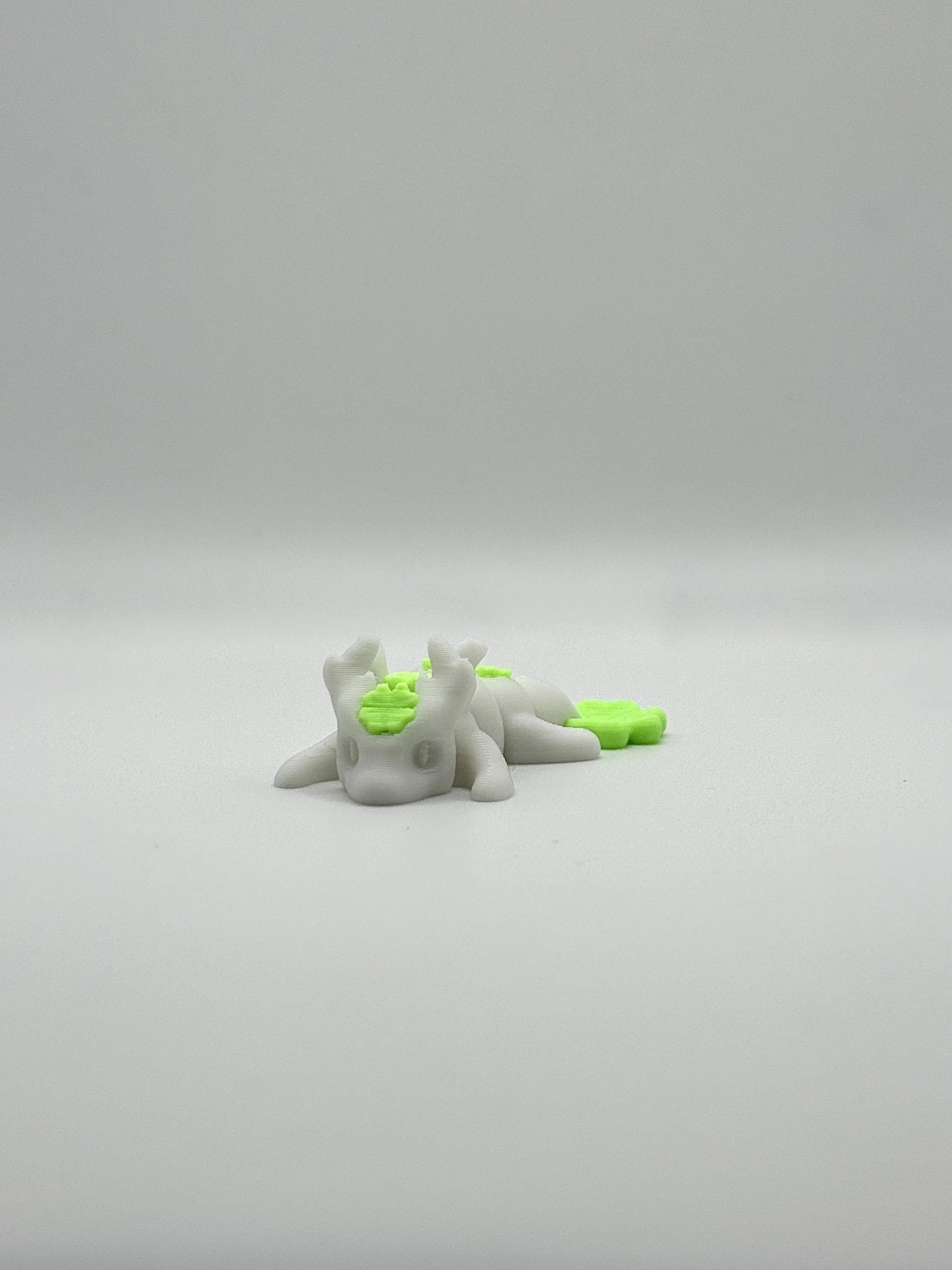 3D Printed Mini Articulated Animal Fidget Toy: Saber3D Design