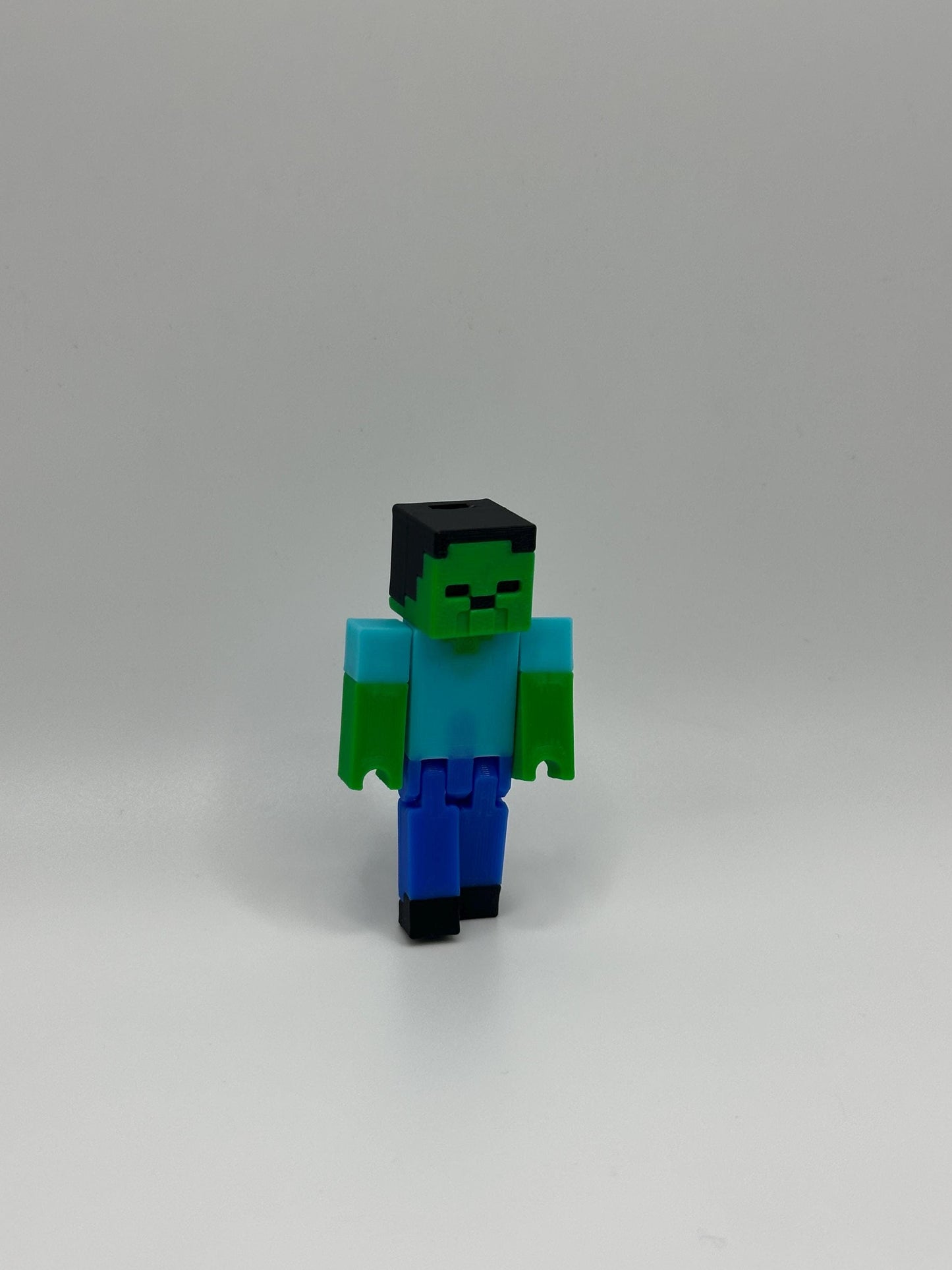 Articulated pixel inspired Zombie Figure – 3D Printed Pixel Toy for Gamers & Collectors – Movable Action Figure