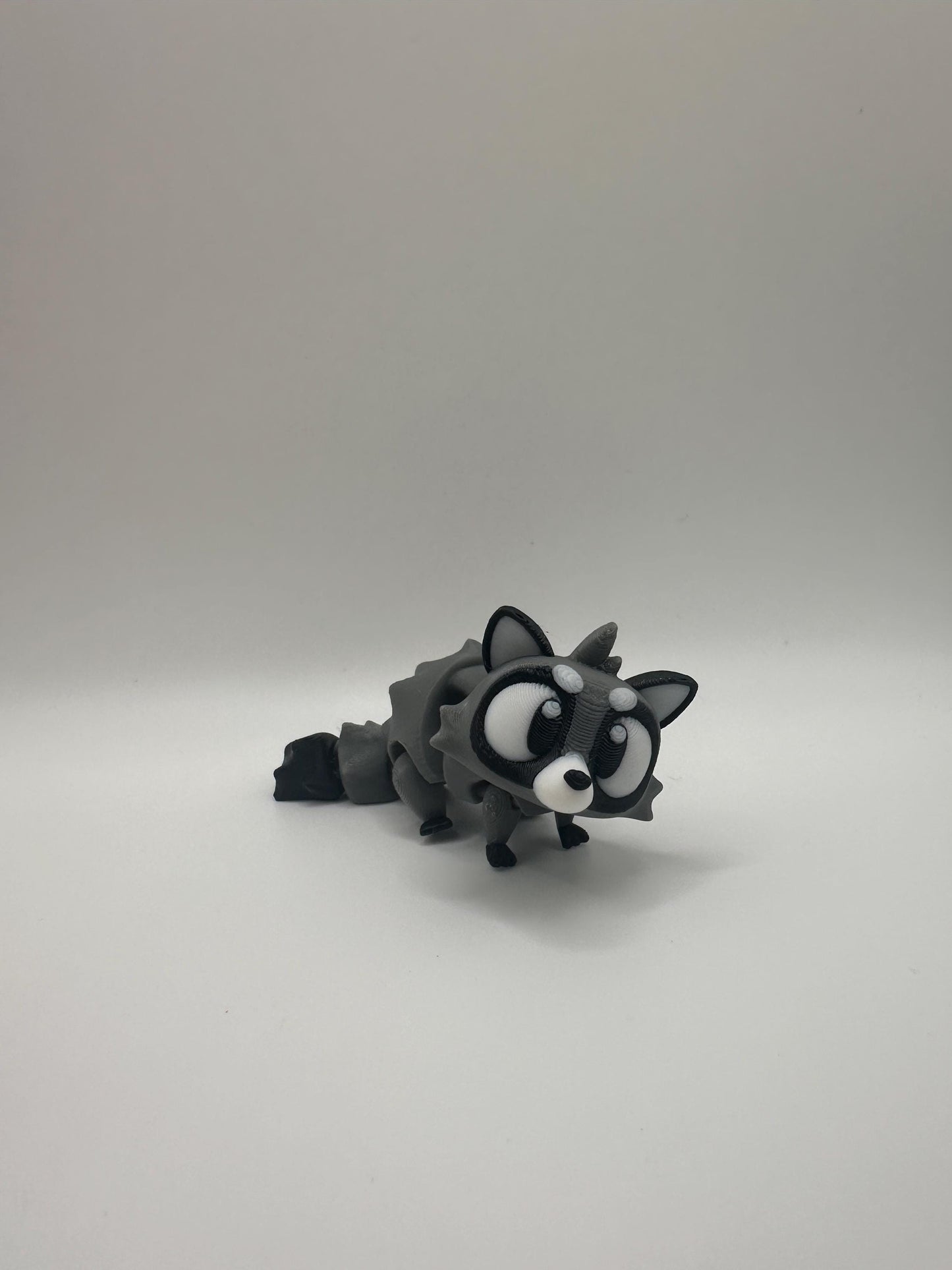 3D Printed Articulated Raccoon Figurine: Movable PLA Collectible