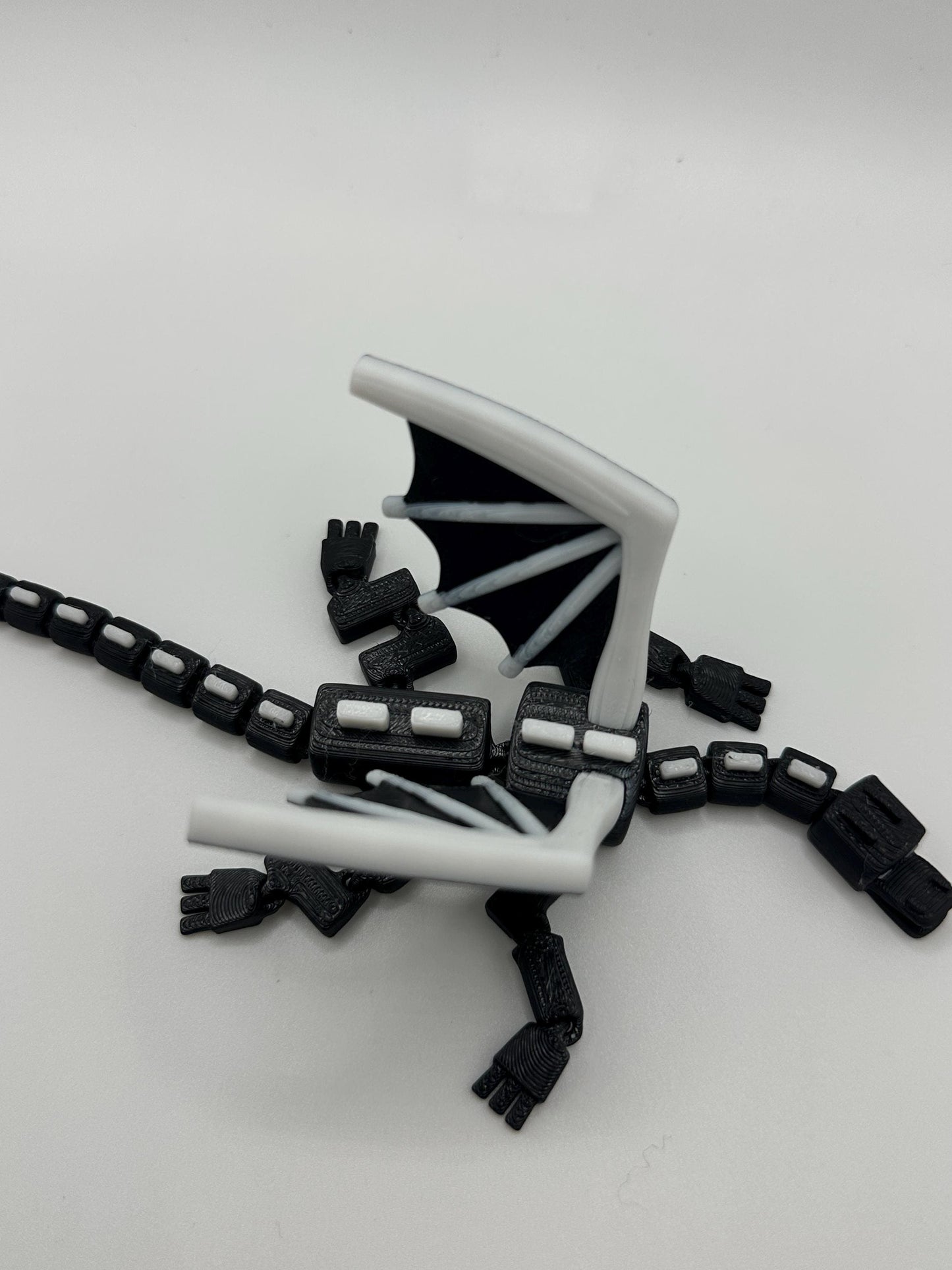 Articulated Dragon Figurine: Black & White 3D Printed Model