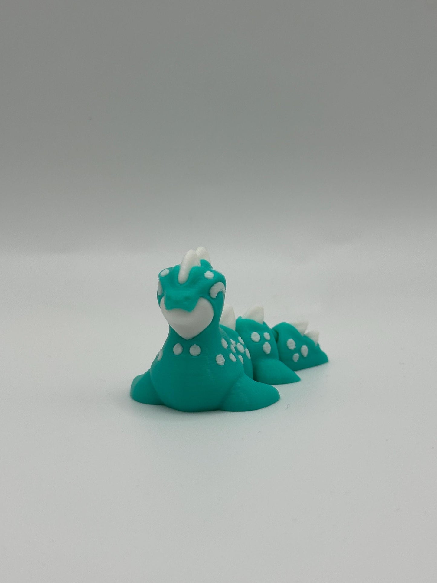 3D Printed Mini Articulated Animal Fidget Toy: Saber3D Design