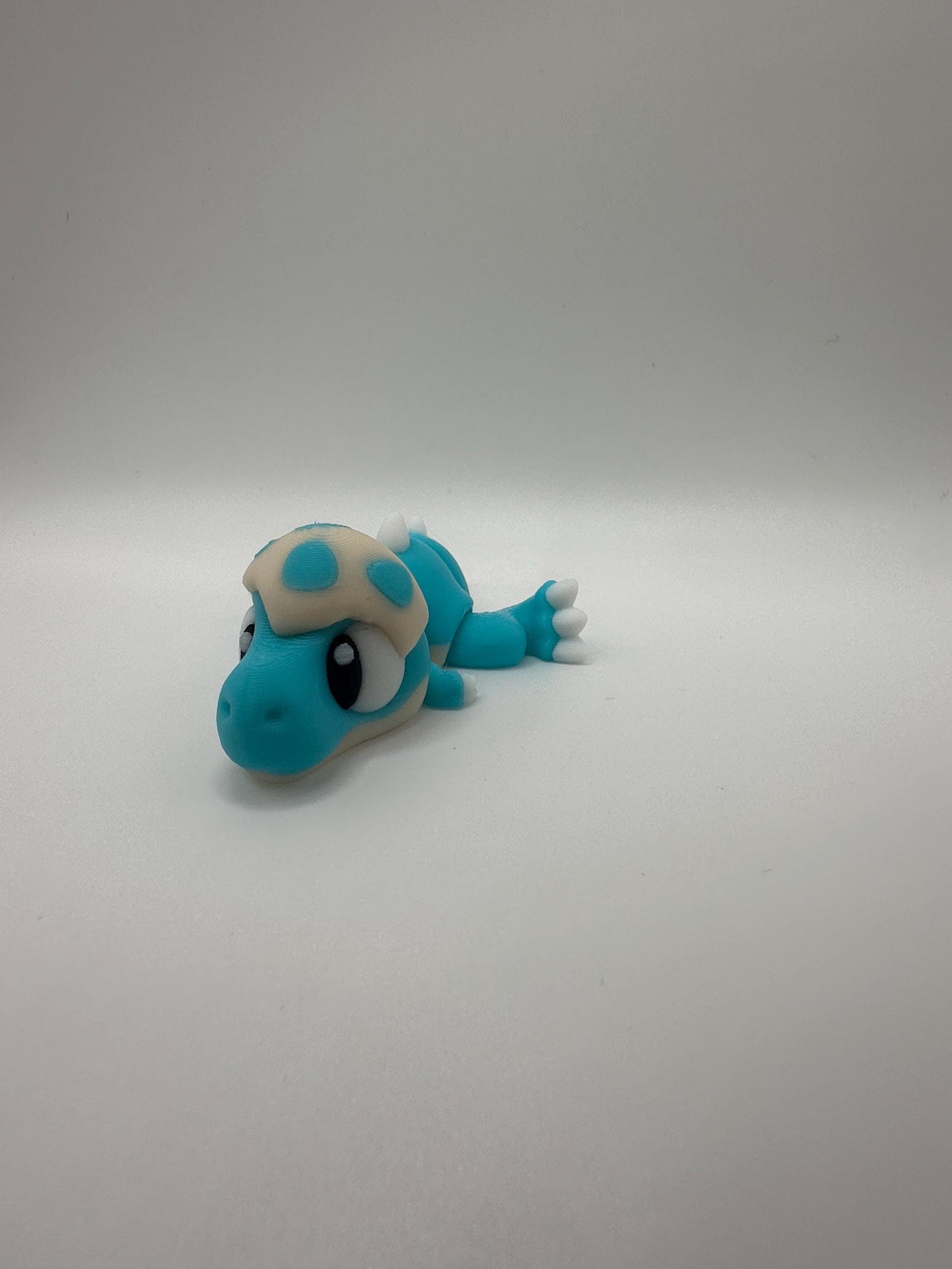 3D Printed Articulated Dinosaur Figurine: Movable Dino Toy