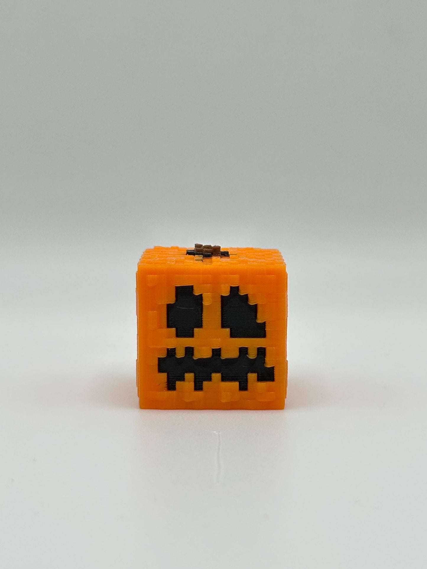 Snow Guardian with Removable Pumpkin Head – Pixel Style 3D Printed Figure