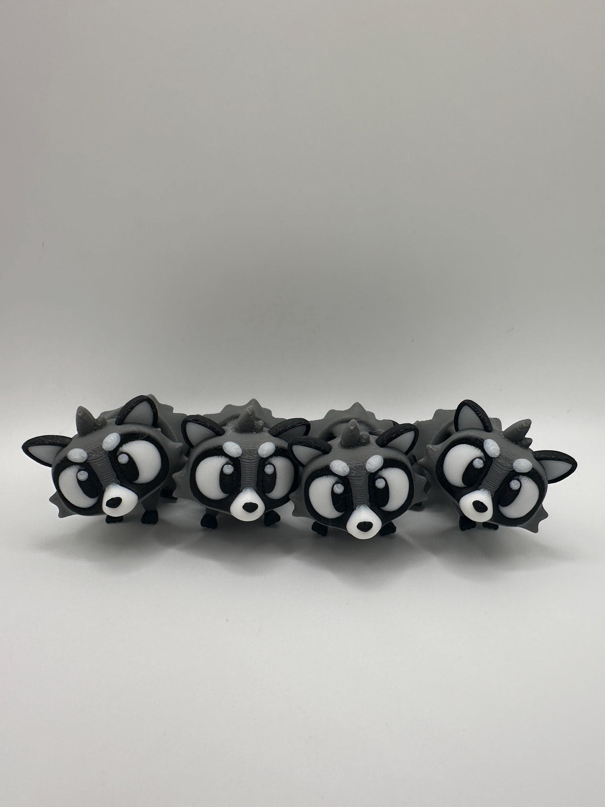 3D Printed Articulated Raccoon Figurine: Movable PLA Collectible