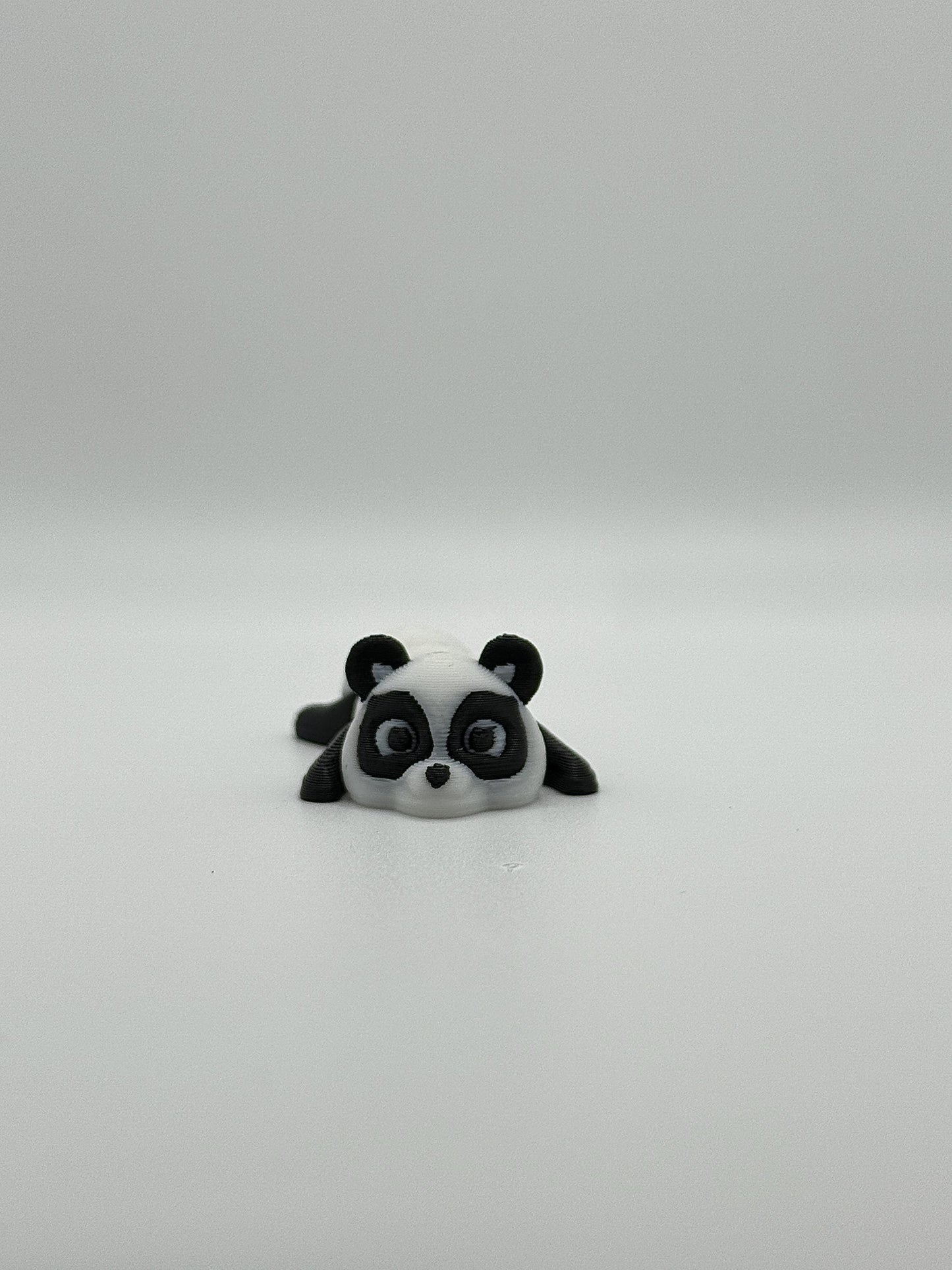 3D Printed Mini Articulated Animal Fidget Toy: Saber3D Design