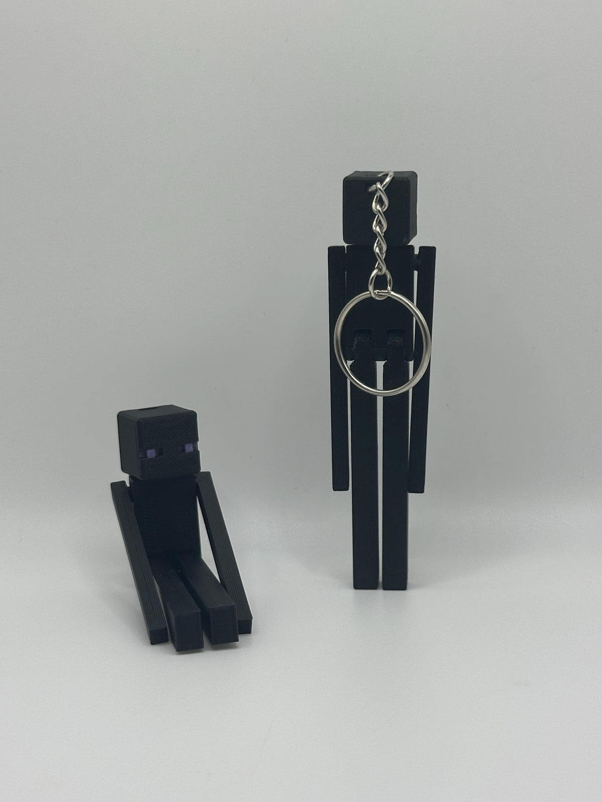 Articulated VoidMan Figure – 3D Printed Toy | Poseable pixel-Inspired Keychain Option