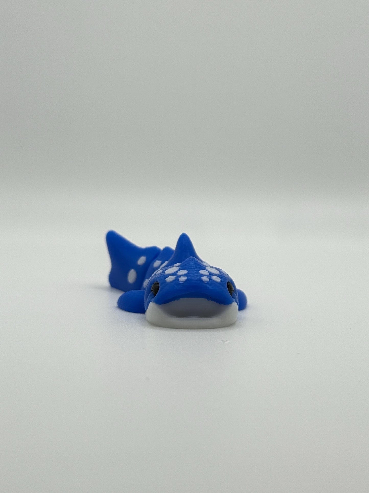 3D Printed Mini Articulated Animal Fidget Toy: Saber3D Design